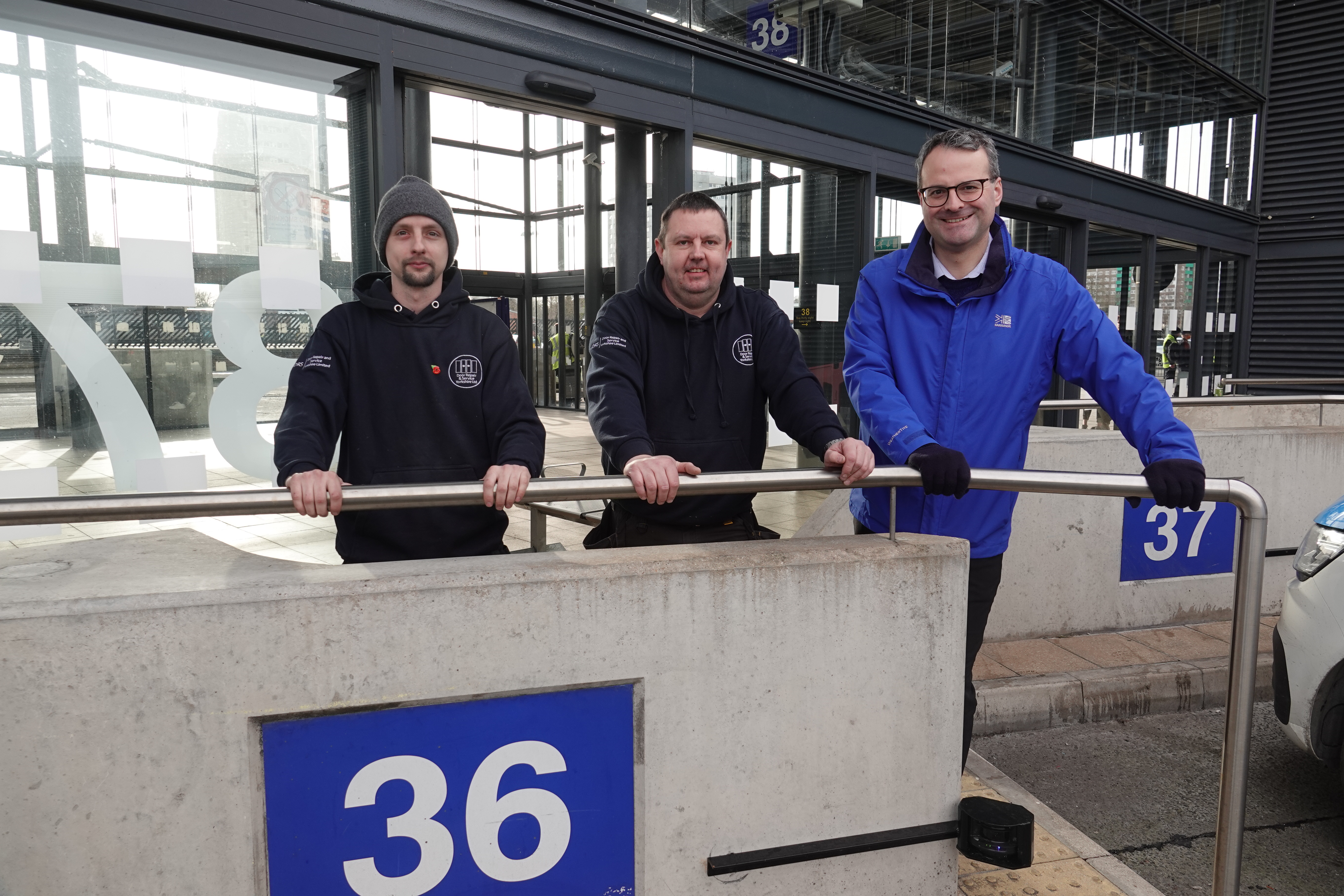 Luke Worrell and Karl Worrell of Door Repair and Service (Yorkshire) Ltd and Councillor Mark Ieronimo