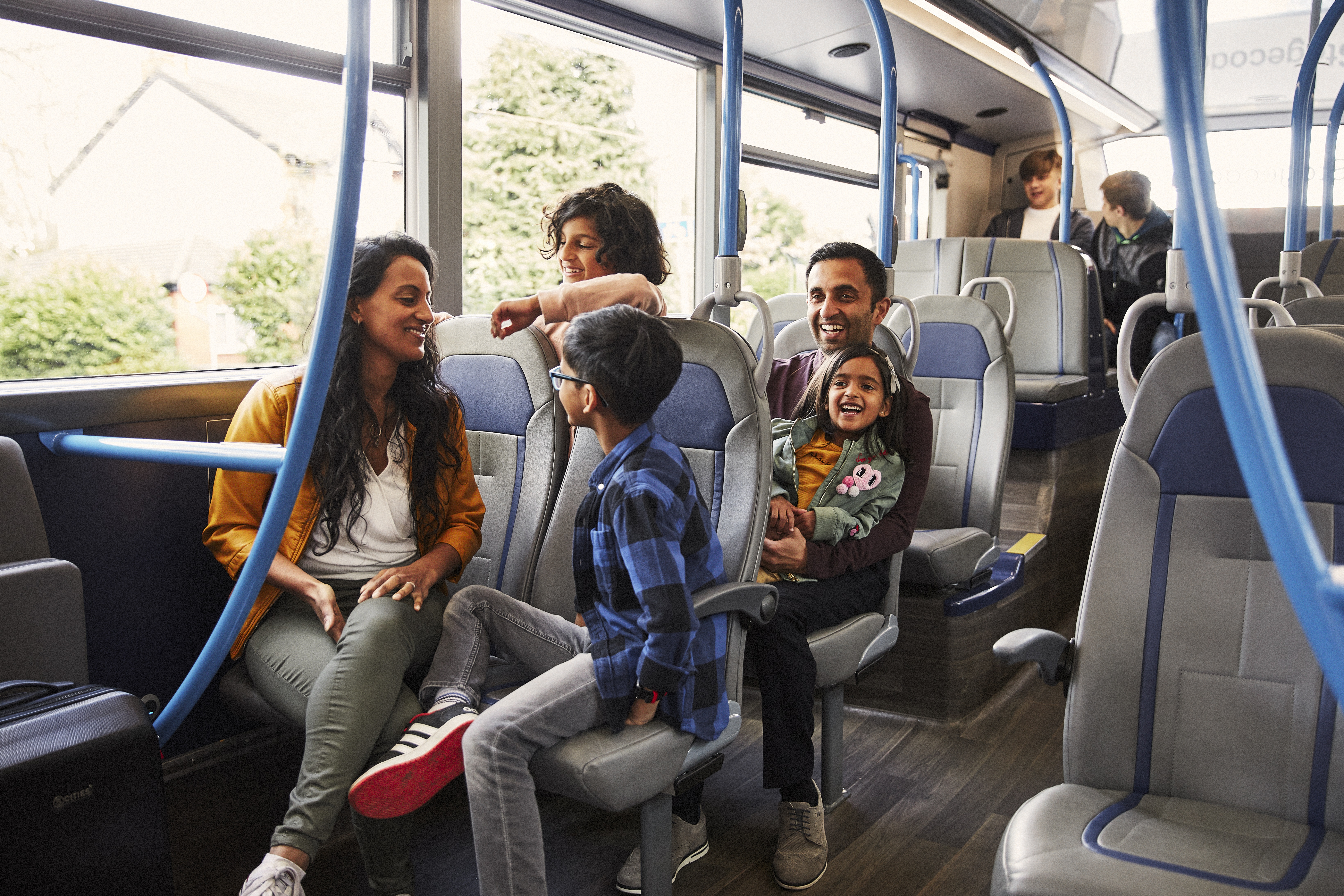 A family riding a Stagecoach bus service